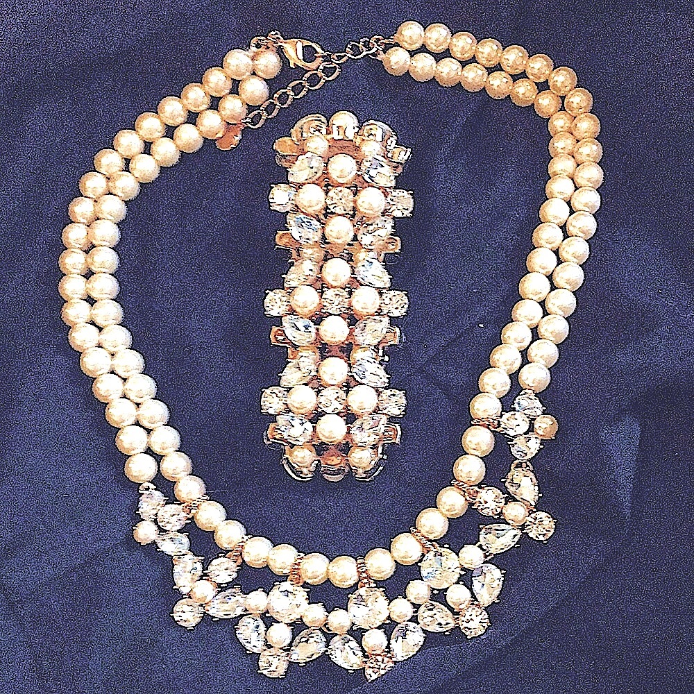Matching set Pearl & Rhinestone Necklace and bracelet. Formal and classic!